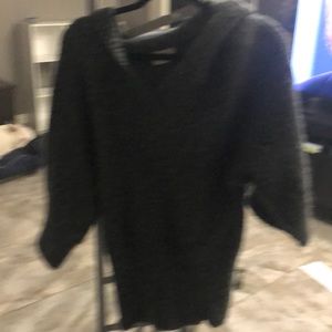 Fuzzy gray sweater with hood.